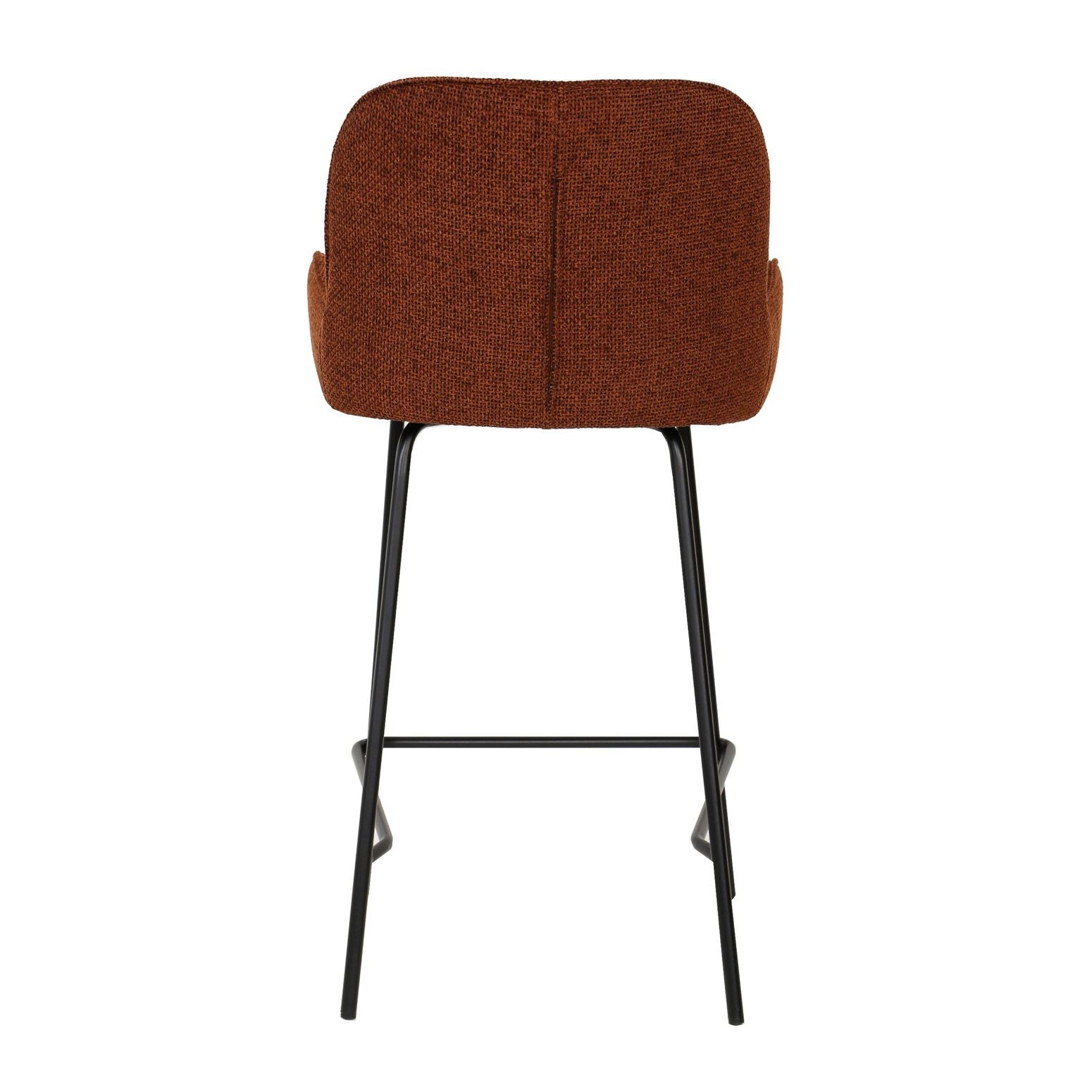 Moderner Barhocker Leander in Rost mit gepolsterter Sitzfläche und stabilen schwarzen Metallbeinen.