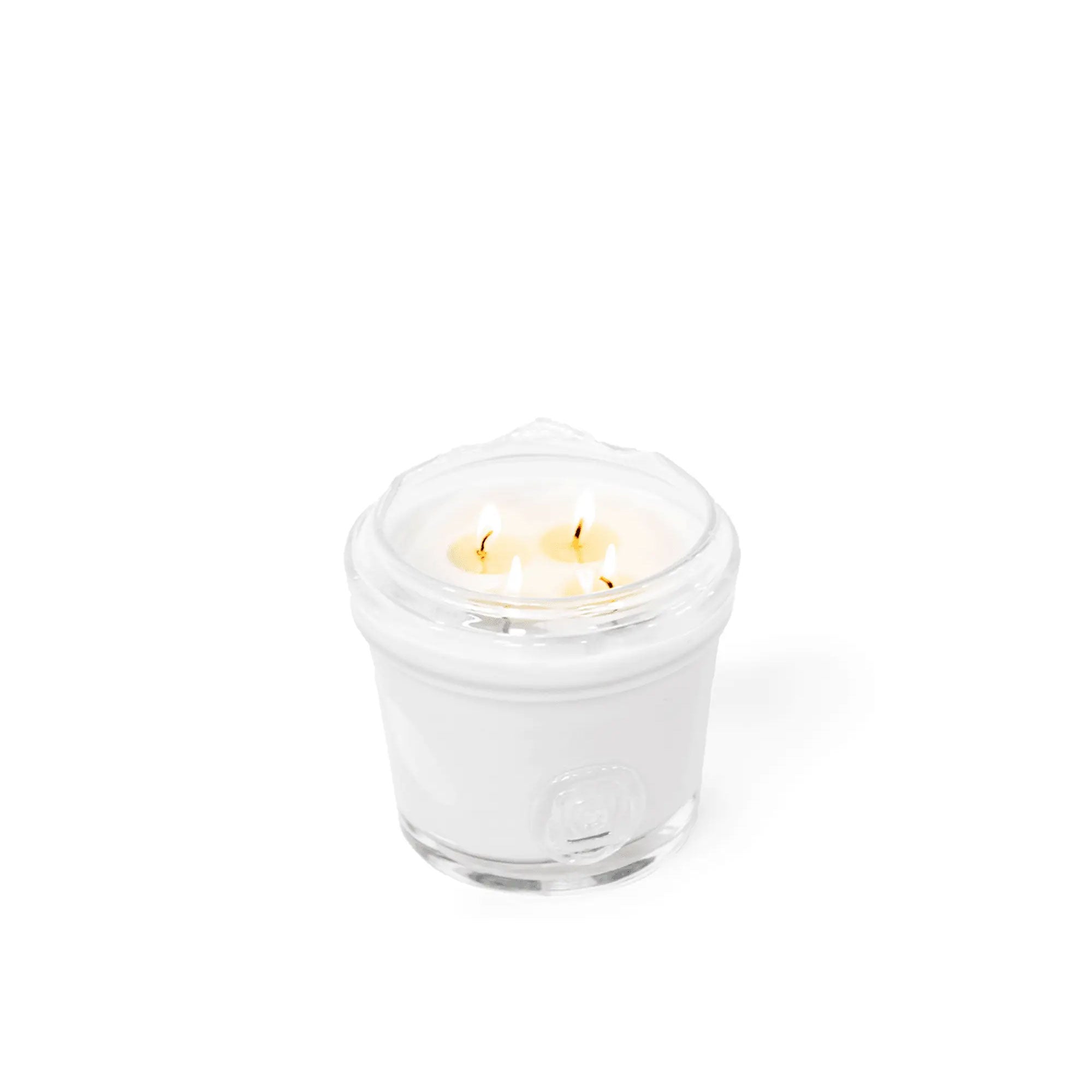 Gommaire Duftkerze Juliette Glas klar mit brennenden Dochten | Gommaire bei STUFF Shop kaufen