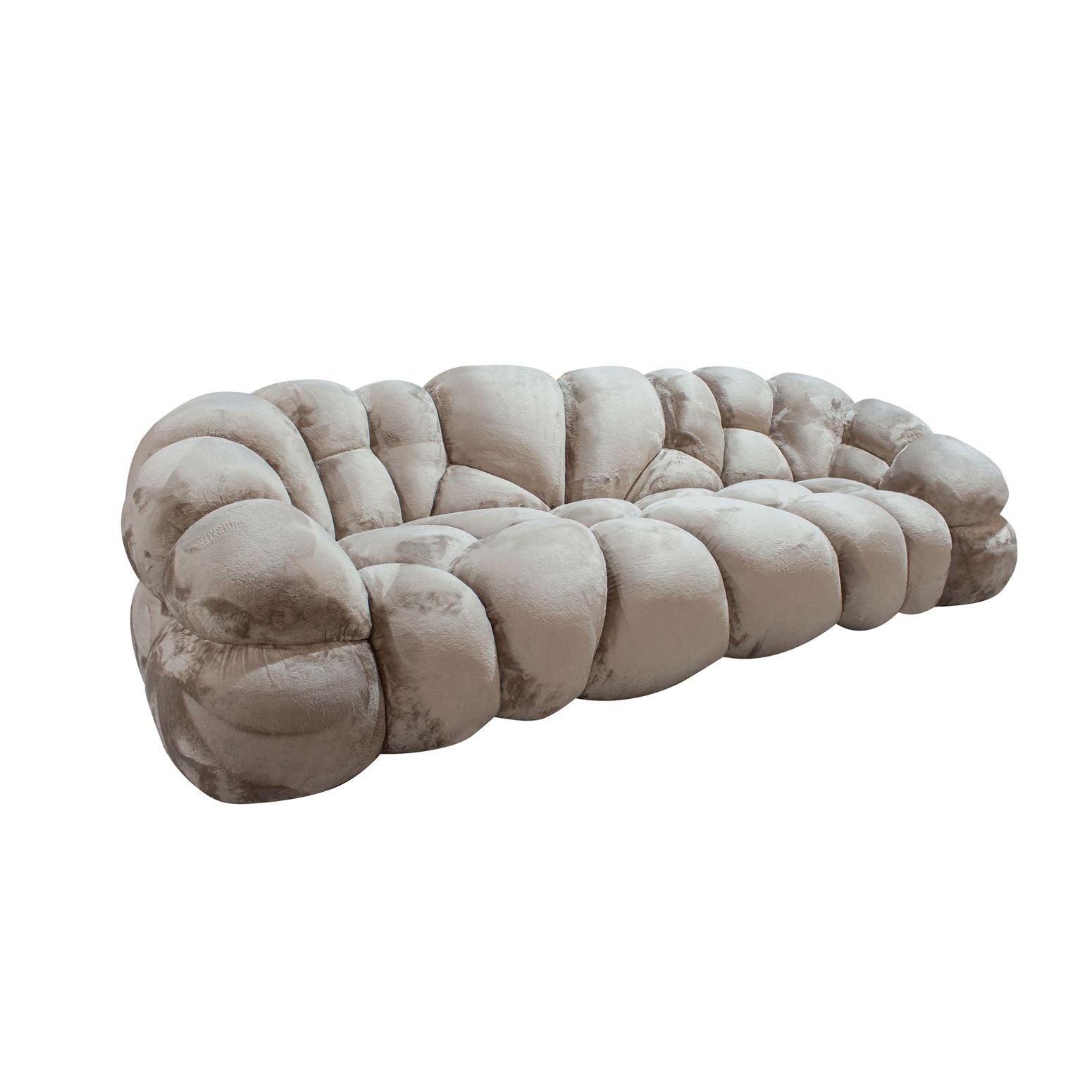 Gesamtansicht des Nubibus Sofas in Beige, ausgestellt in einem stilvollen Wohnambiente.