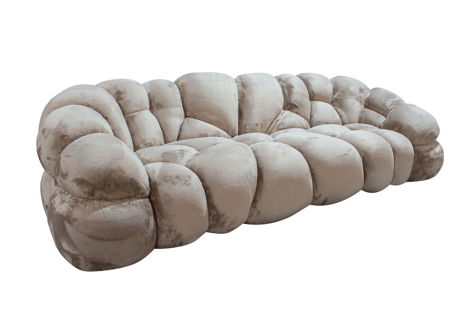 Gesamtansicht des Nubibus Sofas in Beige, ausgestellt in einem stilvollen Wohnambiente.