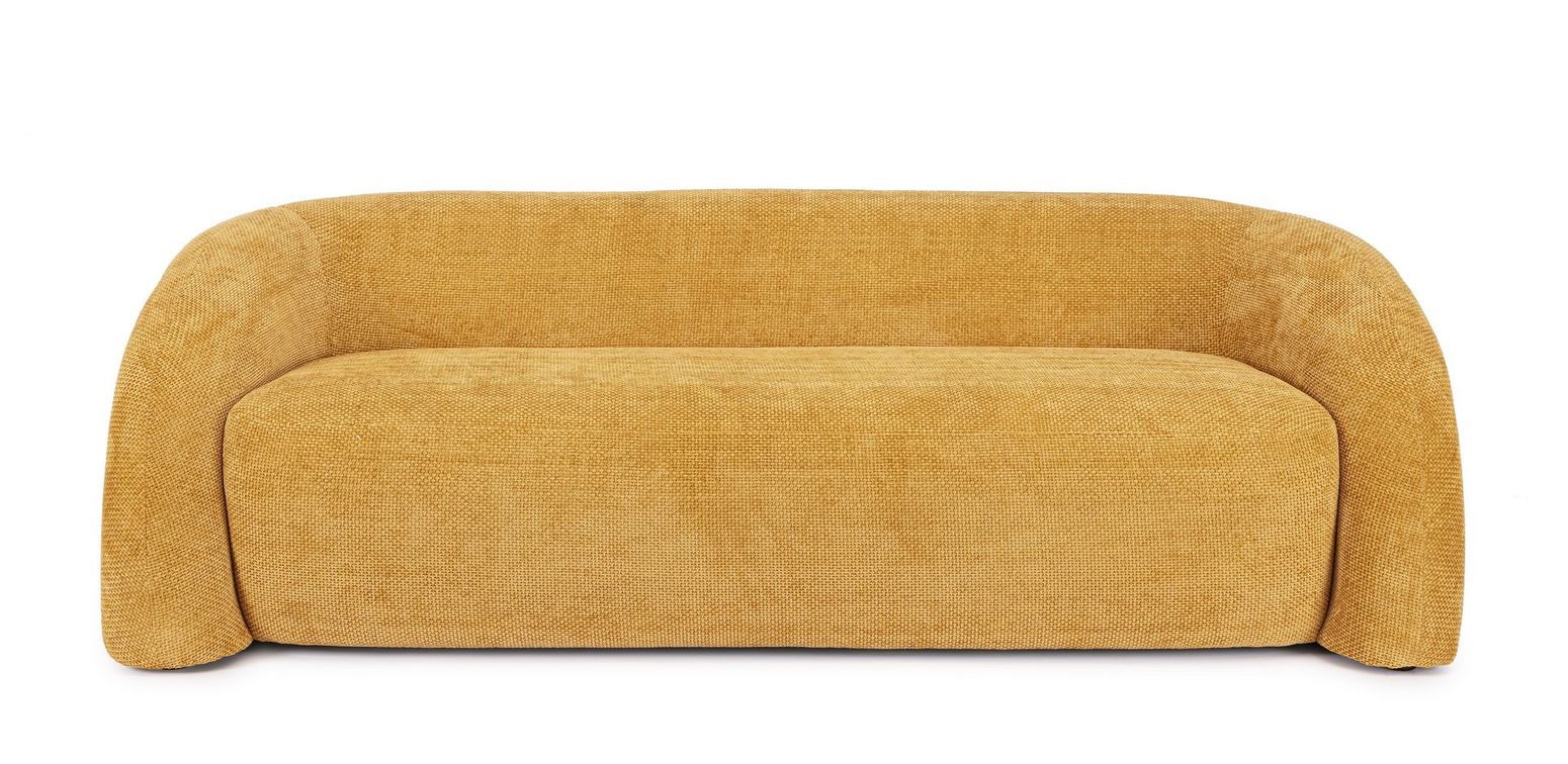 Sofa Clemence in Senf von Bizzotto, leuchtende Farbe und geschwungene Form.