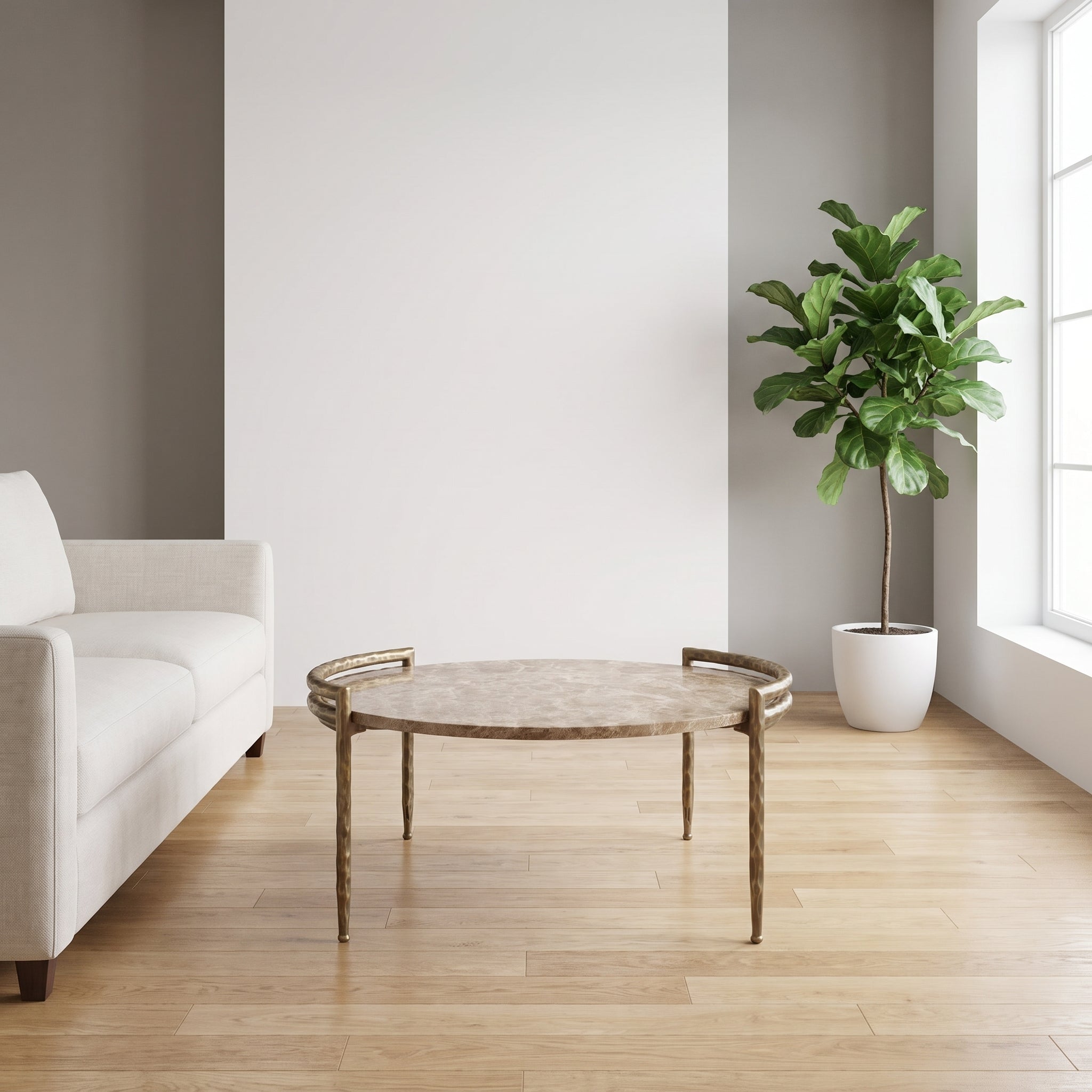 Couchtisch Dented Beige-Gold von PTMD in hellem minimalistischem Wohnraum, STUFF Shop