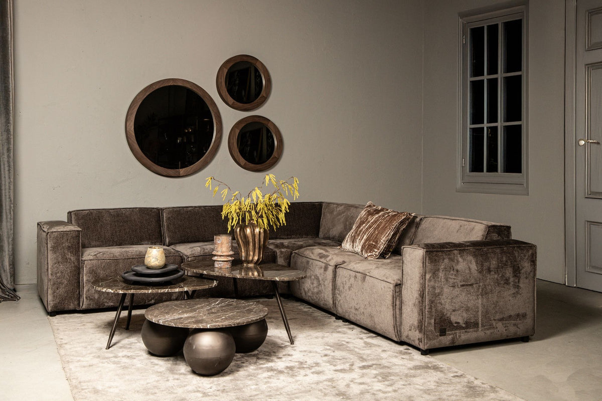 Ecksofa aus Modulen der Serie Trapani von PTMD im Wohnzimmer